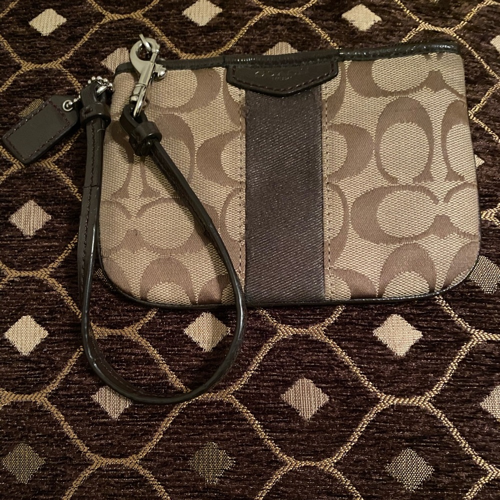 Coach corner zip wristlet. Brown/Beige fabric